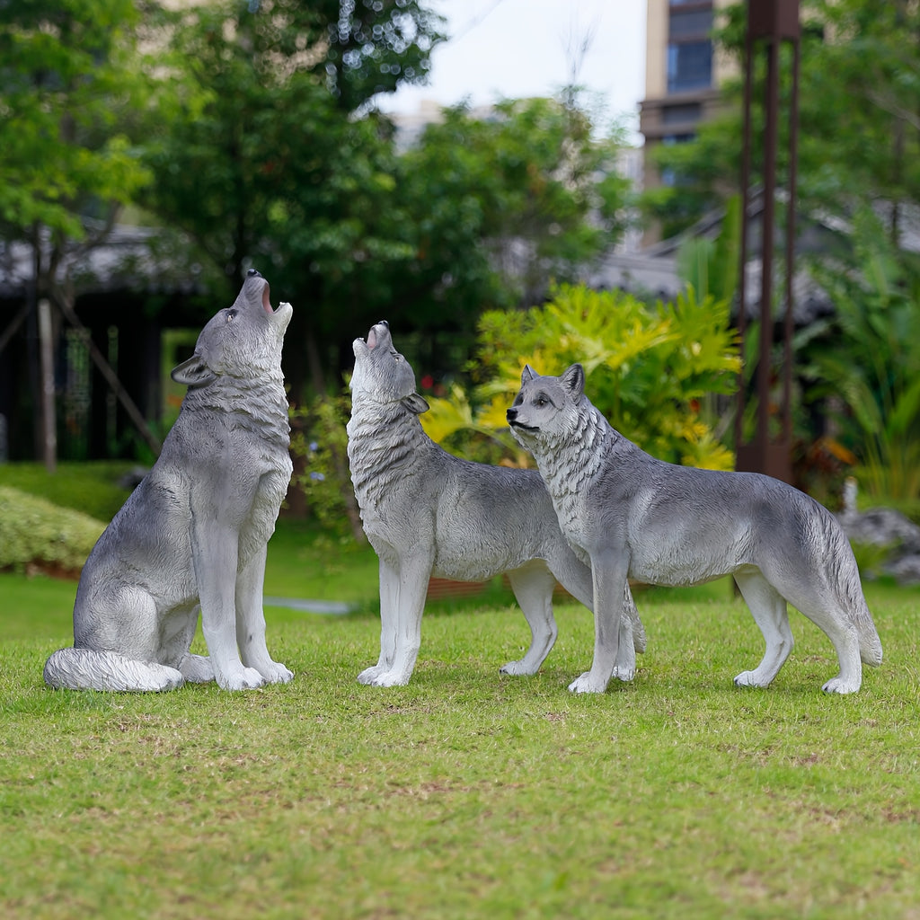 Three Realistic Howling Wolf Sculptures