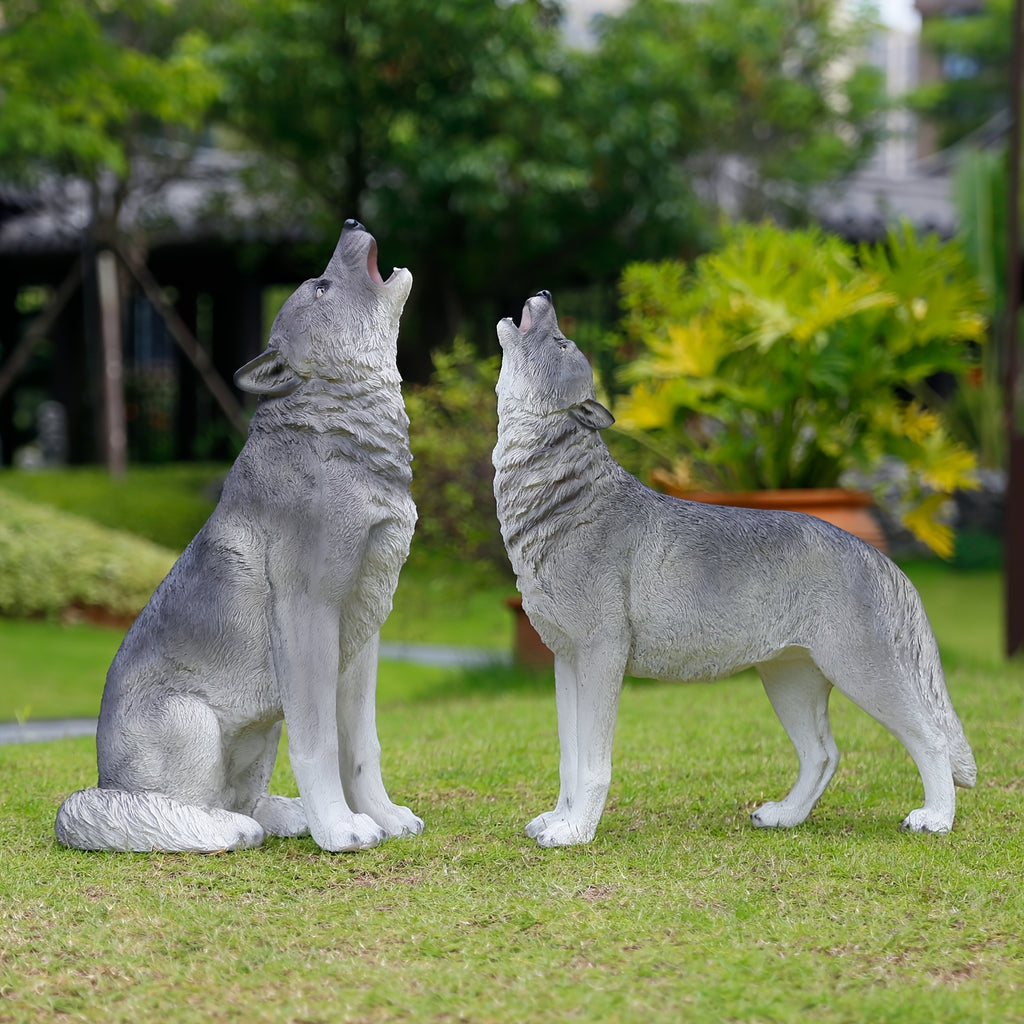 Three Realistic Howling Wolf Sculptures