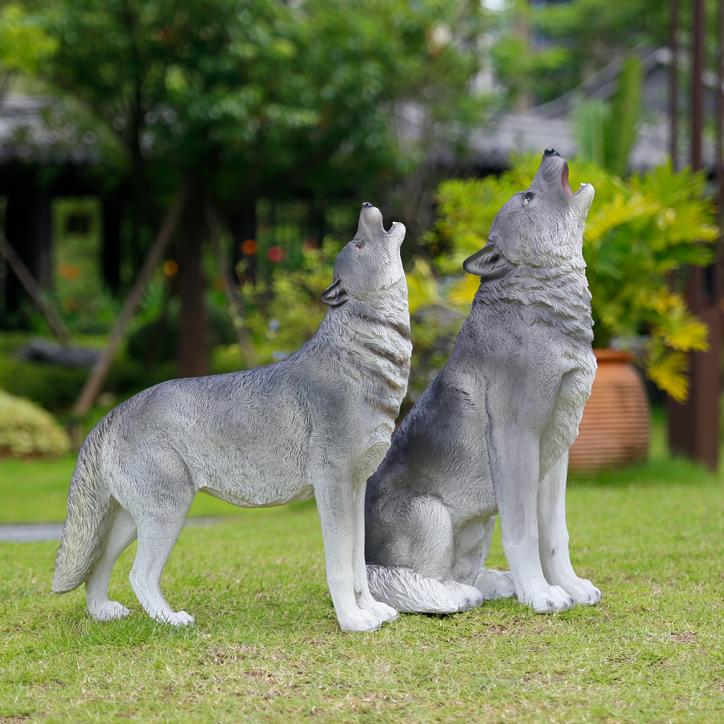 Three Realistic Howling Wolf Sculptures