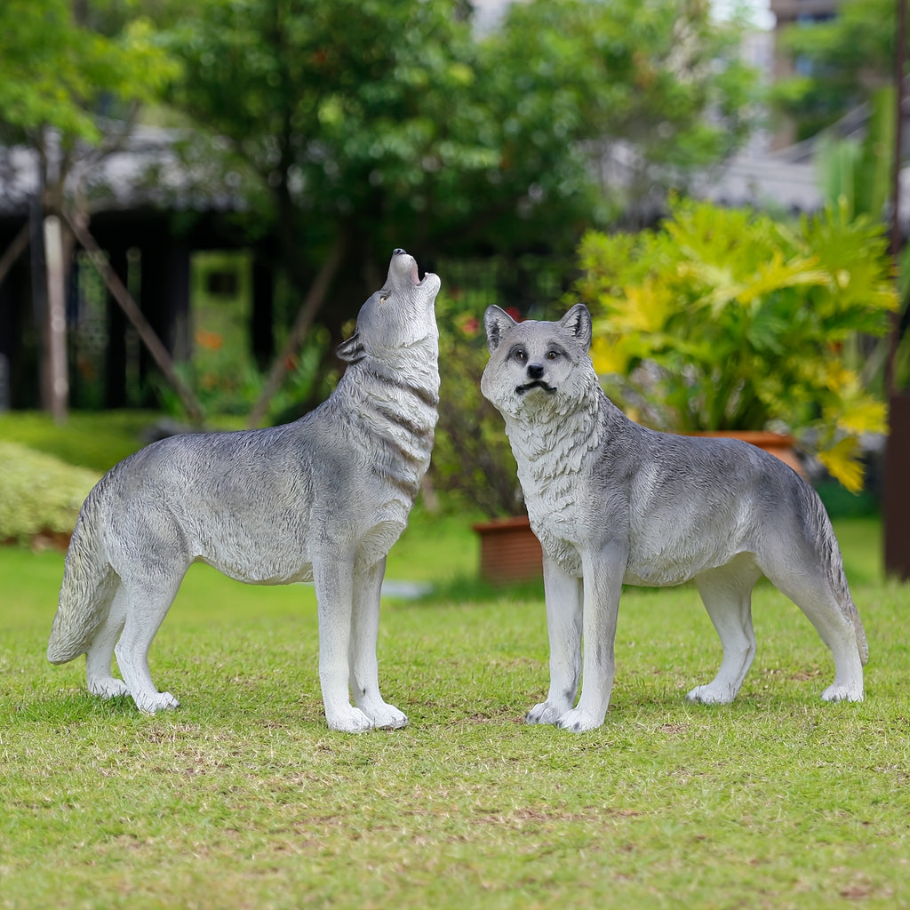 Three Realistic Howling Wolf Sculptures